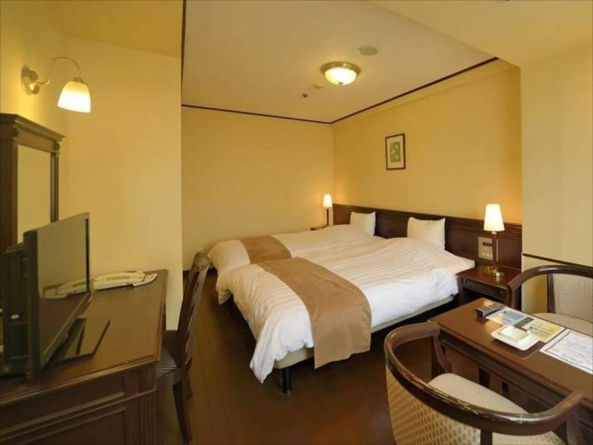 Amami Sunplaza Hotel Exterior foto
