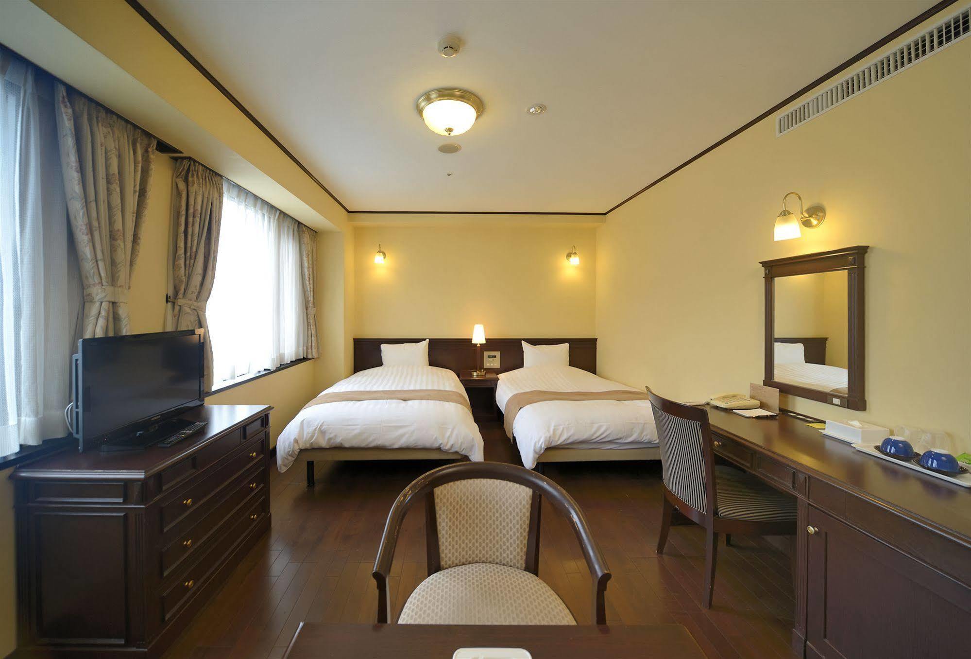 Amami Sunplaza Hotel Exterior foto
