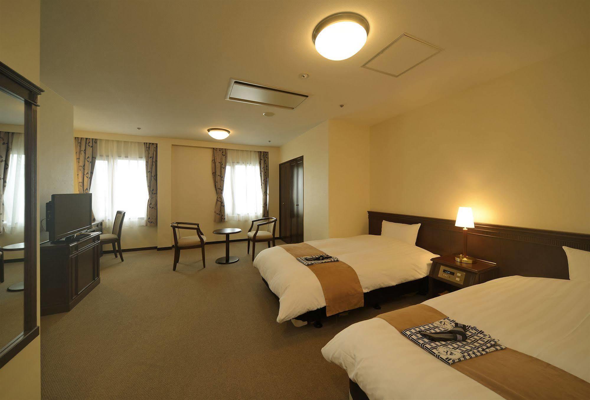 Amami Sunplaza Hotel Exterior foto